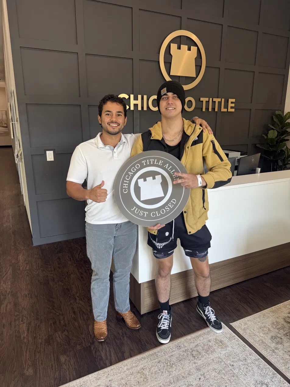 Cristian and Dylan at closing, Chicago Title Allen